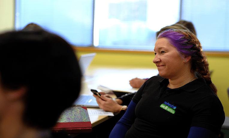 Woman participating in business support workshop