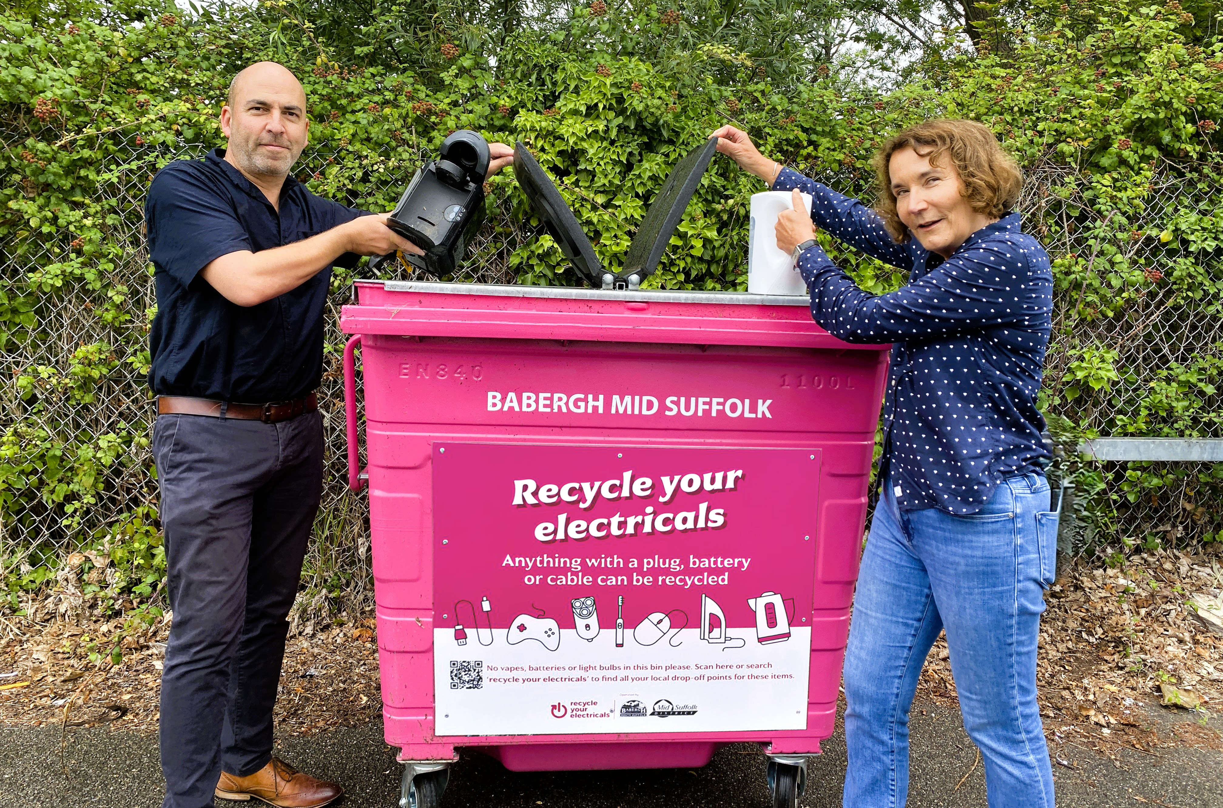 Cllr Tim Weller (left) and Cllr Deborah Saw (right) with a new electrical recycling bank
